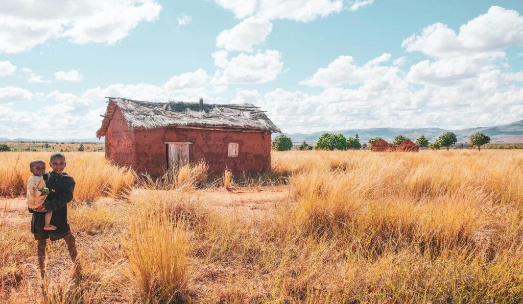 pexels-photo-7506103-7506103 A rustic house in Madagascar's countryside with children playing in it.